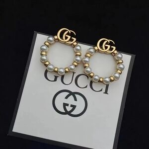 Gucci Gold and White Pearl Double G Hoop Earrings
